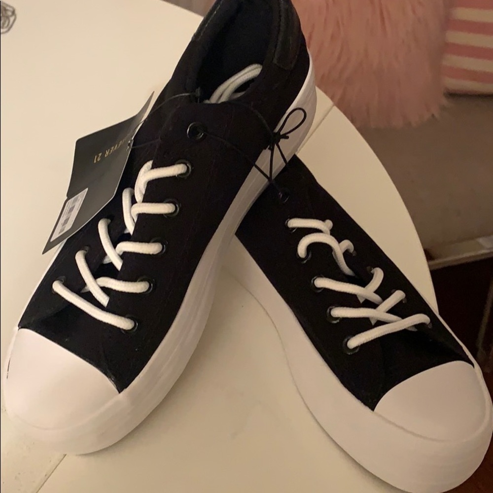 Black high tennis shoes